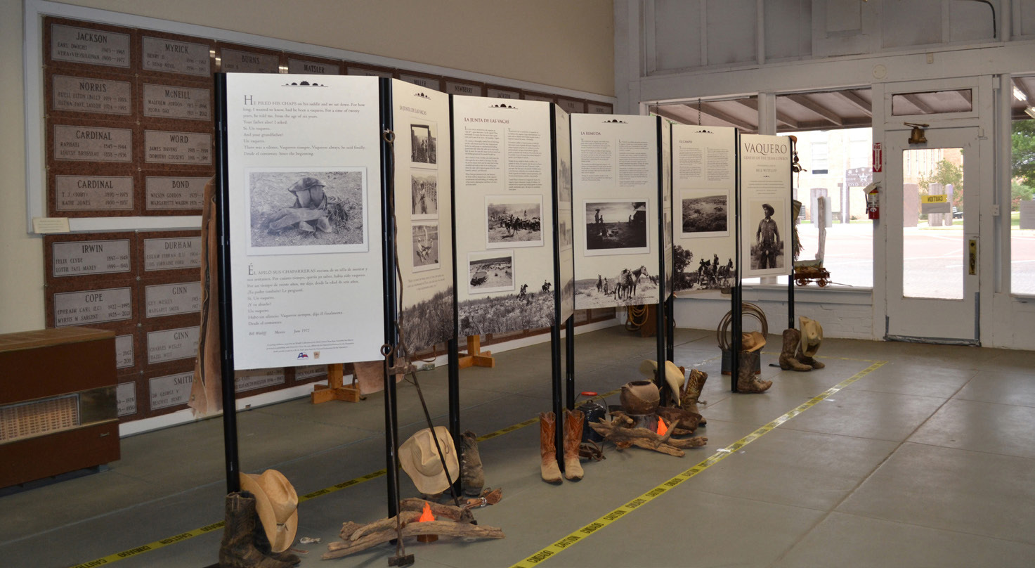 AT THE MUSEUM “Vaquero: Genesis of the Texas Cowboy,” currently on display at the Floyd County Historical Museum, features photographs by the late Bill Witliff with narrative text that reveal the muscle, sweat and drama that went into roping a calf in thick brush or breaking a wild horse in the saddle. | FCHM PHOTO