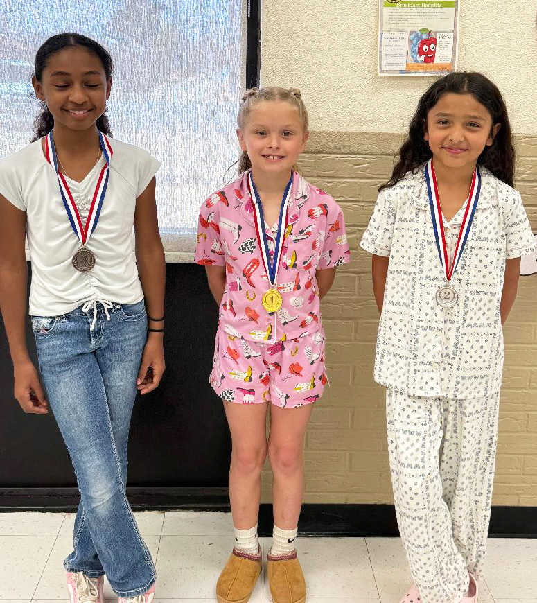 THIRD GRADE poster winners were, from left, Aaliya Henderson, 3rd place; Carson Kellison, 1st place; and Adalynn Perez, 2nd place. | COURTESY PHOTO
