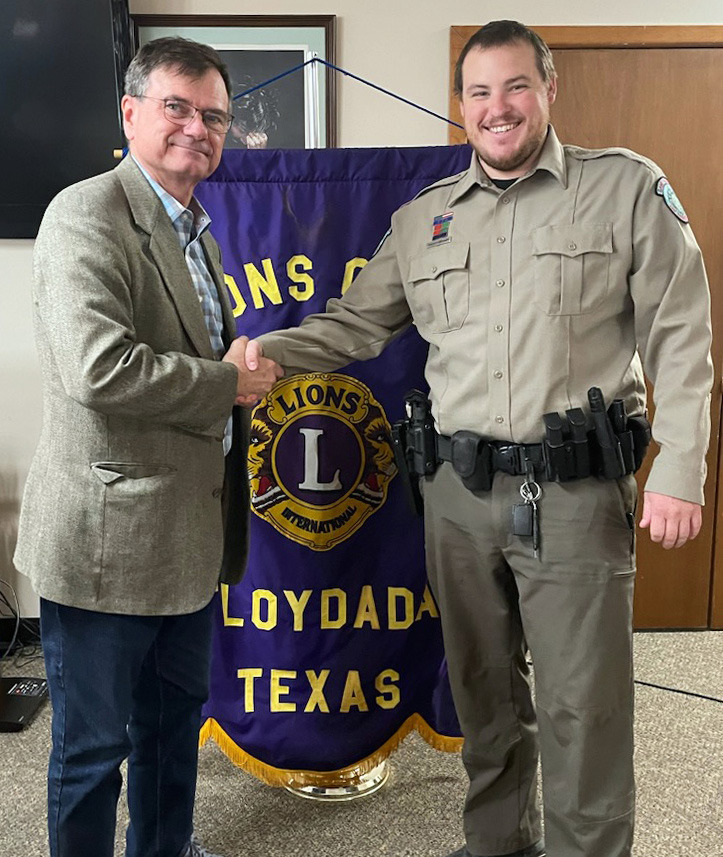 LIONS PRGRAM Rex Teachenor (left), president of the Floydada Lions Club, hosted Hollis Gregory (right), Texas Game Warden for Floyd and Hale County at the April 4 meeting. Both the Lions Club and the Rotary Club of Floydada meet each Tuesday at noon at the First United Methodist in Floydada.