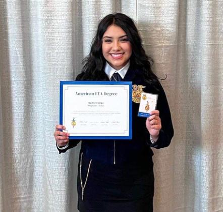 KAITLYN VEGA, Floydada FFA member, is awarded the National American FFA degree on Saturday, November 4, 2023 at the 96th National FFA Convention. | NIKKI SMITH PHOTOS