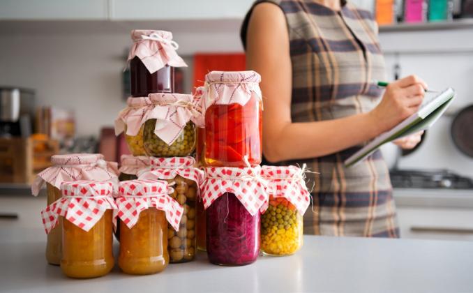 HOME CANNING brings tremendous satisfaction when transforming cucumbers into bread and butter, dill, or sweet pickles; fresh peaches become jam; fresh apples are applesauce or apple butter; and preserving extra produce like peppers, okra, tomatoes, tomatillos, and beets. | iSTOCK PHOTO