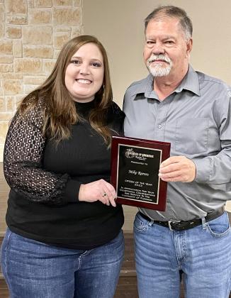 MIKE REED (right) was named Floydada Citizen of the Year by the Floydada Chamber of Commerce, for his years of selflesst devotion to his community. Chamber president Kalli Martin presented the plaque. | HESPERIAN-BEACON