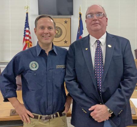 REP. DUSTIN BURROWS (above, left) spoke with Floyd County Judge Marty Lucke (right) and local constituents during a recess at commissioners' court Monday morning. | MAX McNABB, HESPERIAN-BEACON