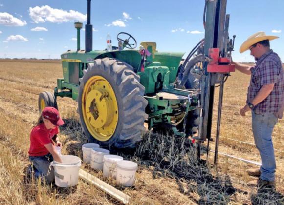 DEEP SOIL TESTING The Texas A&amp;amp;M AgriLife Extension Service agronomy crew at Amarillo take deep soil tests in wheat stubble. | TEXAS A&amp;amp;M AGRILIFE PHOTO BY JOURDAN BELL