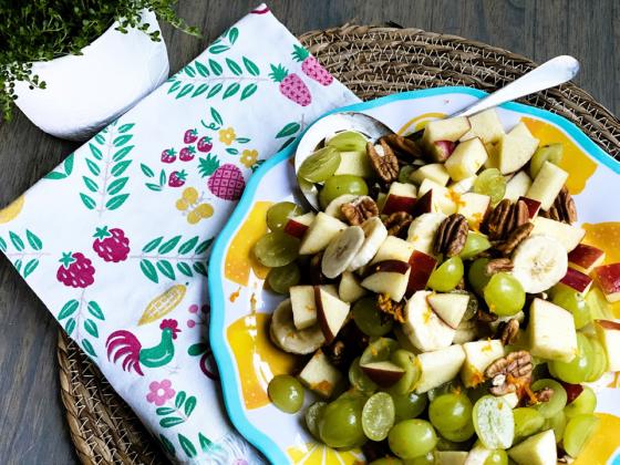 Simple summery fruit salad with toasted pecans