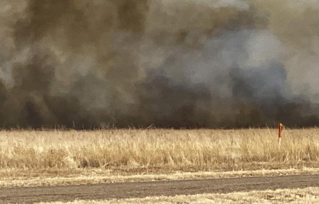 A FAST-MOVING GRASS FIRE burned more than 600 acres of dry land between Lockney and Floydada Sunday afternoon, with DPS closing U.S. Highway 70 to traffic for a while. | FRED CERVANTES PHOTO