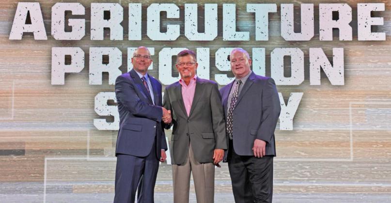 REIN-MAKERS Agriculture Precision Supply recognized by Reinke Manufacturing Company. Shown from left, Reinke President Chris Roth, Mark McCormick and Joe O’Brien, Central Region Territory Manager (South). | COURTESY PHOTO