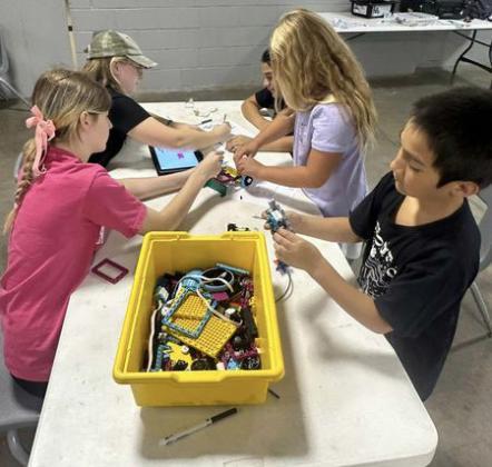 FLOYD COUNTY 4-H students attended the Robotics Camp held on July 26 at the Unity Center. Participants said the camp was loads of fun! Mason Scott led the program with help throughout the day from Ben Trevino, Laney Scott and Sydni Chesshir. | FLOYD COUNTY AGRILIFE EXTENSION SERVICE PHOTOS