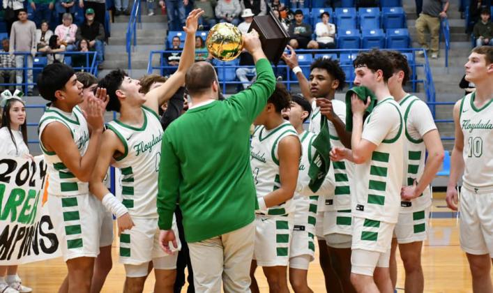 BACK-TO-BACK PLAYOFFWINS TheWhirlwinds opened the postseason last week by racing past Bovina 79-39 in the bi-district round. Things were a little tougher a few days later in an area game against Wheeler, but Floydada held on to silence Wheeler 86-75. | FLOYDADA YEARBOOK STAFF PHOTOS