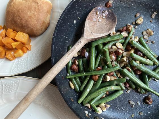 FRESH AND FANCY Fresh green beans seasoned with a garlic are wonderful for our typical dinners, but for the holidays, fresh greens beans accented with shallots and toasted hazelnuts take plain green beans from average to fancy. | ANGELINA LaRUE PHOTO