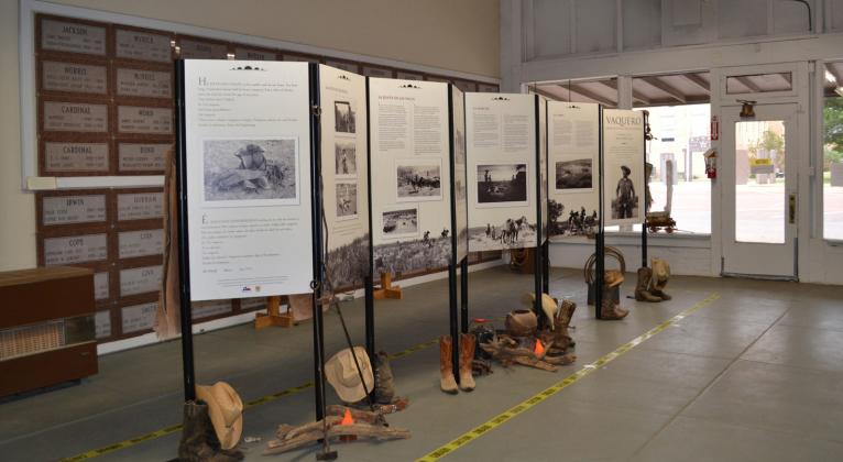 AT THE MUSEUM “Vaquero: Genesis of the Texas Cowboy,” currently on display at the Floyd County Historical Museum, features photographs by the late Bill Witliff with narrative text that reveal the muscle, sweat and drama that went into roping a calf in thick brush or breaking a wild horse in the saddle. | FCHM PHOTO