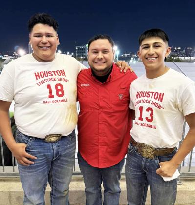 Adrian Jimenez, Mr. Froilan Beltran and Nick Cervantes rest up before Houston Calf Scramble