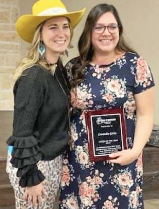 CHAMBER AWARDS Floydada Chamber vice-president Whitley Nutt (left) recognizes Cassandra Garza (right) of the Floydada Animal Shelter as the Citizen of the Year. Ace Hardware was not present at the banquet to receive their Business of the Year award | COURTESY PHOTO