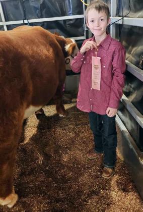 STOCK SHOW Congratulations go to Blaine Yeary of Floydada for finishing in fourth place in the lightweight Polled Herefords at the Sandhills Stock Show &amp; Rodeo last Saturday at Ector Coliseum in Odessa. Blaine, the son of Brad and Molly Yeary, shows through the Floydada FFA. | COURTESY PHOTO