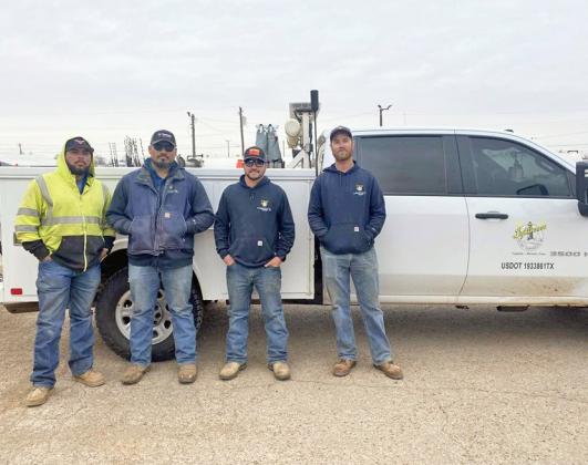 Lighthouse Electric Cooperative has sent six linemen to the Canadian, Texas, area to help rebuild infrastructure damaged in the fires for North Plains Electric Cooperative. The linemen from the Floydada office are Hector Rodriguez, Herry Santos, Aaron Saenz, and Jeremy Siewert. The linemen from the Memphis office are Cam Washington and Randy Wiggins. | COURTESY PHOTO
