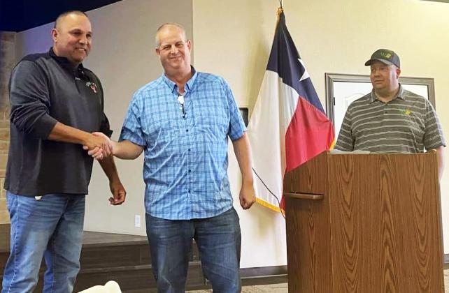 Roel Cisneros (left) was recognized for 30 years of service.