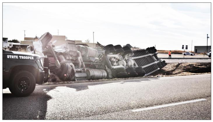 Semi wreck claims life at busy Lockney intersection