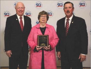 FARM BUREAU HONORS Dianne Washington (center) accepted the Texas Farm Bureau (TFB) District 2 Pioneer Award on Dec. 2 on behalf of the late Seab Washington of Motley County. The award was presented by TFB President Russell Boening (right) and TFB Secretary-Treasurer / District 2 State Director Walt Hagood. | COURTESY PHOTO