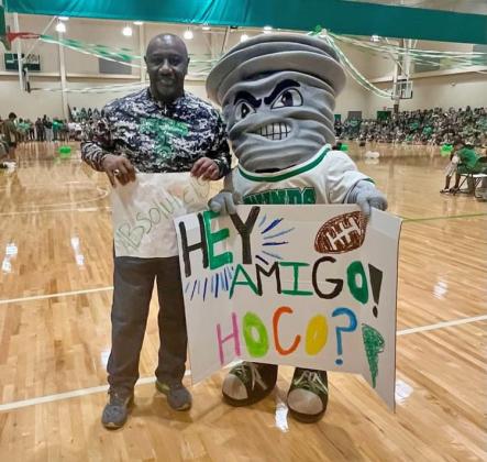PREPARING TO SWEEP AWAY SMYER at last week’s Floydada pep rally were Head Coach J.R. Compton and Windy the Whirlwind mascot. HOMECOMING HIGHLIGHTS, PAGE 4 | FCISD PHOTO