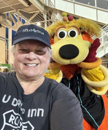 ORBIT (at right, not the figure in the Texas Spur cap) is the wacky mascot of the Albuquerque Isotopes baseball team, the only franchise in professional sports to get its name from a“Simpsons” TV episode. | THE TEXAS SPUR