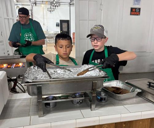 FLOYD FLIPPERS The Floyd County 4-H Grilling Games participants had a good time helping with the Punkin Days Pancake Breakfast on Saturday, Oct. 11. MORE PHOTOS, PAGE 8 | COURTESY PHOTOS