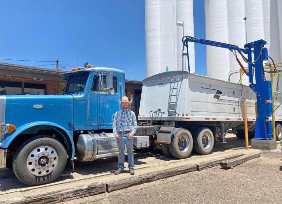 JUNE PRODUCERS COOPERATIVE ELEVATOR in Floydada received the season’s first load of wheat, deivered by Logan Everett.