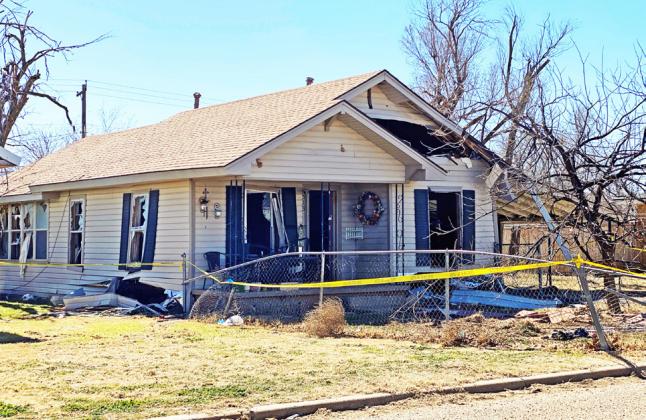 BARRICADED INSIDE this house on W. Grover St. in Floydada for several hours, fugitive Alberto Guerrero was taken into custody around 3 a.m. Saturday. Guerrero is jailed on a $3 million bond. | HESPERIAN-BEACON