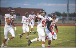 Longhorns win first district game over Crosbyton, 26-21