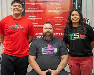 LOCKNEY POWERLIFTING COACH Chris Pritchard, shown here with state women’s competitor Annalicia Hernandez (right) and men’s qualifier JR Jimenez (left) said, “My goal for everyone that comes to Lockney’s program,” he said, “and the thing that drives me, is seeing these kids succeed in the things they do. Even when they struggle with it, they always come back to work harder and become better and stronger.” | CERVANTES PHOTOGRAPHY