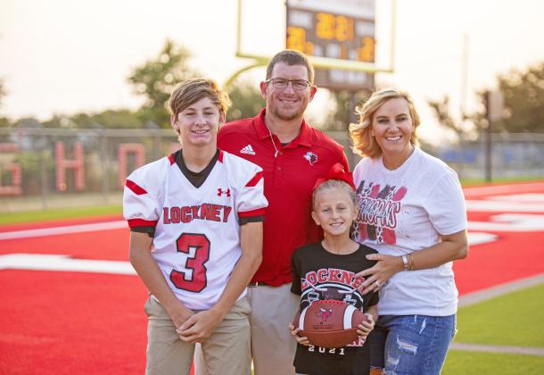STEPPING UP Coach Jonathan Thiebaud and his wife, KayCee (right), have two children in Lockney ISD: Dyllan is a freshman at Lockney High School and Anna is in the fourth grade at Lockney Elementary. | CERVANTES PHOTOGRAPHY