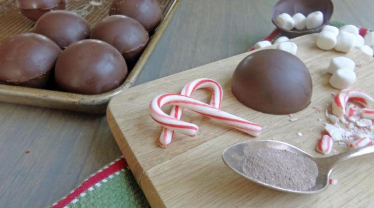 JUST DROP INTO WARM MILK and the cocoa bomb’s magic will happen quickly, depending on how hot the cup of milk is.| ANGELINA LaRUE PHOTO