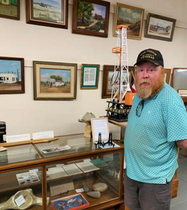 FLOYDADA HISTORICAL LEGACY Chase Carr recently visited the Floyd County Historical Museum to view an exhibition of works by his late grandfather, James Haven (Jim) Word. | COURTESY PHOTO