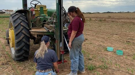 LOWERING COSTS Texas A&amp;amp;M AgriLife Extension Service agronomy team members take deep soil samples in stubble before starting the new planting season. AgriLife Extension researchers recently published a study suggesting that deep soil testing may be able to help farmers reduce fertilizer costs. | JOURDAN BELL/TEXAS A&amp;amp;M AGRILIFE