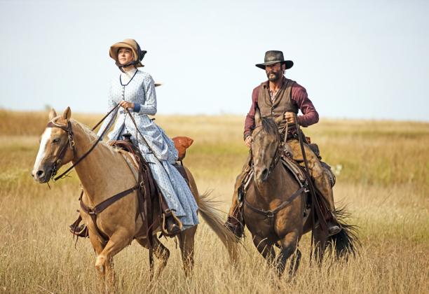 HOW THE WEST WAS WORN Costumes pictured on Elsa Dutton (Isabel May) and James Dutton (Tim McGraw) from the hit TV series ‘1883’ are on display at the National Ranching Heritage Center. | PHOTOGRAPH COURTESY OF 101 STUDIOS AND PARAMOUNT+