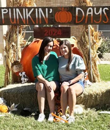 HAVE PUNKIN’ DAY! Stopping to enjoy a photo session were longtime friends Heather McClellan of Lubbock (left) and Britney Griffin of Lago Vista, Texas. Both attended Texas Tech University in Lubbock and were sorority sisters. Britney was in Lubbock visiting for the weekend and they decided to come to Floydada to see what Punkin’ Days was all about. This was their first ever visit to the festival! | HESPERIAN-BEACON