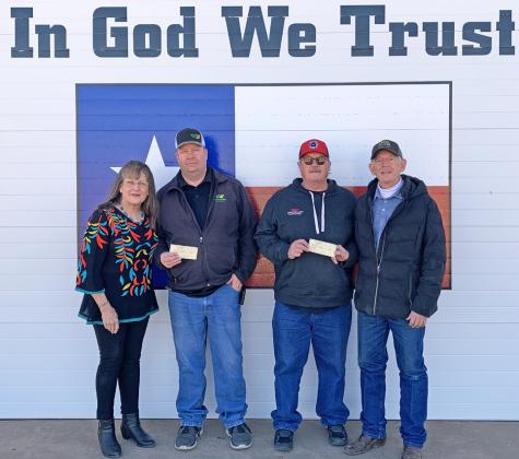 COUNTRY CHRISTMAS BALL DONATIONS totaling $25,000 were made by event organizers Dustee and Wendell Sollis to the Floydada and Lockney firefighters’ departments, all proceeds from the December 2024 annual event. From left to right are Dustee Sollis, Chad Guthrie, Floydada fire chief, Donnie McLaughlin, Lockney Fire Chief, and Wendell Sollis | COURTESY PHOTO