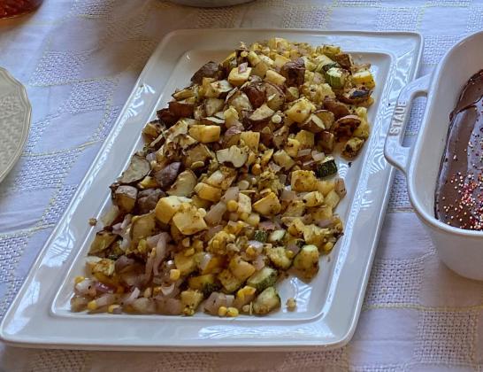 SUMMER SIDE DISH of squash, potato cubes and diced onion makes a perfect accompaniment for barbecue or Sunday dinner. | ANGELINA LaRUE PHOTO