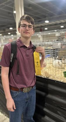 HOUSTON HONORS Congratulations go to Mia Snowden and John Taylor Snowden for placing with their rabbits at the Houston Stock Show. Mia placed second in her class, and JT placed fourth. | FLOYDADA CISD PHOTO