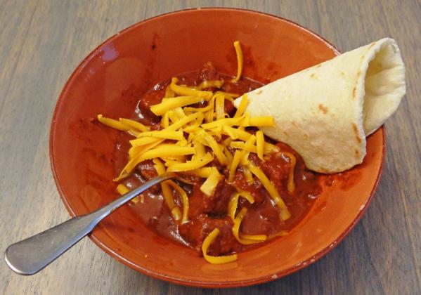 BIG, BEEFY CHUNKS OF BRISKET will satisfy the hungriest folks, in this make-ahead chili that slowly cooks in the crockpot while you’re busy watching the big game, or movies with your family. | ANGELINA LaRUE PHOTO