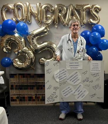 FROM DELIVEREDTO DELIVERING, Dr. Kevin Stennett of Lockney has experienced it all—and has no intention of slowing down. Staff honored him with a party last week. | COURTESY PHOTOS
