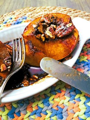 JUST PEACHY You just can’t go wrong with juicy fruit paired with cinnamon, and ooey-gooey maple syrup, along with the crunch of toasted pecans drenched in a decadent glaze. | ANGELINA LaRUE PHOTO