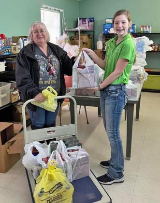 Snowden delivers Souper Bowl donations to Floyd County food banks