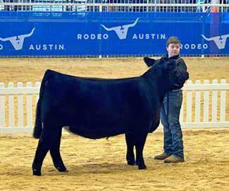 FLOYD CO. HONORS IN AUSTIN Floyd County 4-H brought home the hardware at the Rodeo Austin Livestock Show. Braxton Cole won the Angus Show and Champion British Heifer. Brailey Kidd won the Simmental class and earned Reserve Champion Simmental. Aaron Rexrode also placed 6th in a deep Simmental class. | COURTESY PHOTOS