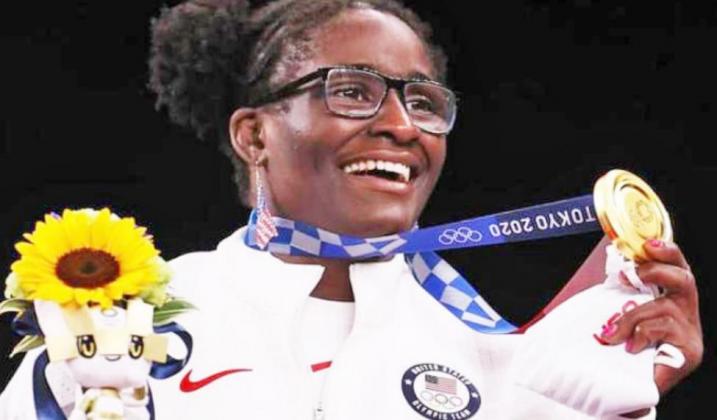 TAMYRA MARIAMA MENSAH-STOCK (left) is an American wrestler who competes in women's freestyle wrestling. She won the gold medal at the Tokyo Olympics on August 3, 2021, and is the first black woman to have done so.