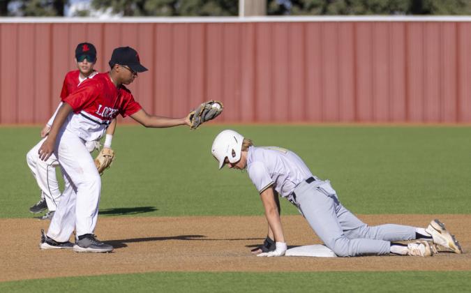 Aatrayu Leal Short Stop Trying to tag them stealing 2nd.