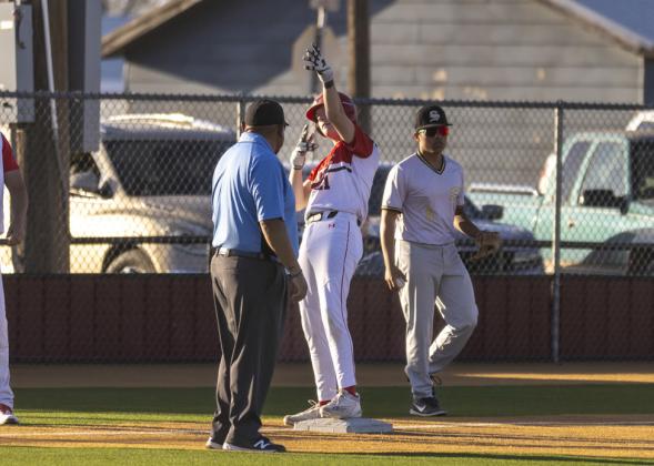 Tucker Southard celebrates a triple .