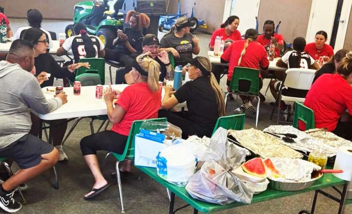 FLOYDADA HOSPITALITY After concluding their inaugural series on Sunday in Floydada, the Hub City Adelitas softball team were treated to a barbecue lunch, with a meal provided by Rickey Hughes and Roger Hughes. Gabe Delafuente grilled the barbecue, and Floydada CISD provided the drinks. The school expressed thanks on its Facebook page to these gentlemen and “everyone else who volunteered their time to make these games possible.” FCISD PHOTO