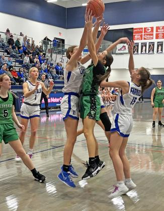 TOO FAR A STRETCH for Floydada, the dominant Farwell squad knocked the Lady Winds out of contention for the second year in a row on Feb. 10. Floydada’s Allyson Romero goes up for the jump. MORE PHOTOS, PAGE 8 | SUE JANE SULLIVAN