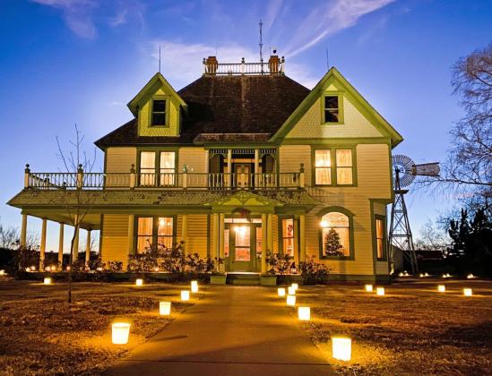 THE 1908 BARTON HOUSE has become one of the most popular attractions for Candlelight at the Ranch visitors during four decades of celebrating a pioneer Christmas. The National Ranching Heritage Center will host the annual family-friendly event from 6:30 p.m. to 9 p.m. Dec. 10 and 11. | COURTESY PHOTO by Shelby Schwartz