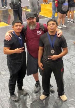 POWERLIFTING RESULTS From left, Lockney’s Darrin Jimenez, Coach Pritchard and Russell Casillas celebrated after both boys qualified for the state by their lifting totals from the regional powerlifting meet held March 14 at Post ISD. The THSPA State powerlifting meet is scheduled to take place on Thursday, March 27, at the Taylor County Expo in Abilene. | COURTESY PHOTOS